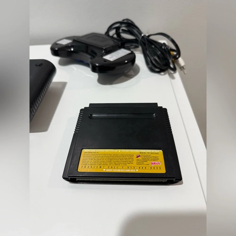 AtGames Sega Genesis Classic Console + Game Genie + Controller Retro Gaming